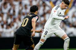 开云体育在线-瓦伦西亚主场战平，保住西甲前四位置